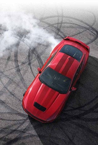 Overhead view of a 2024 Ford Mustang® model with tire tracks on pavement | Bob Sight Ford Inc in Lees Summit MO